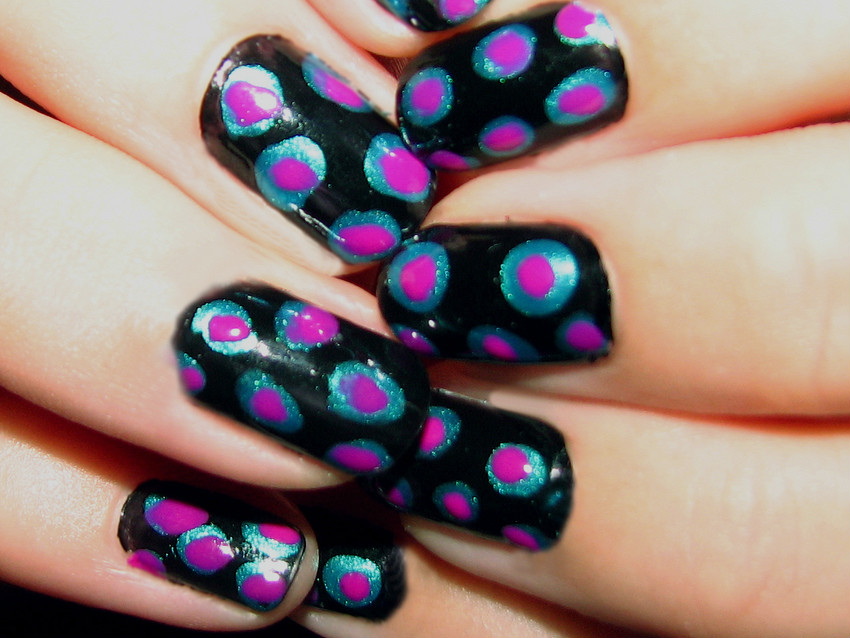 Fingernails with polka-dot paint job