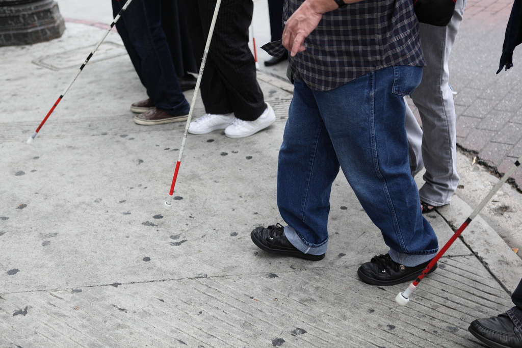 Blind pedestrians with white canes
